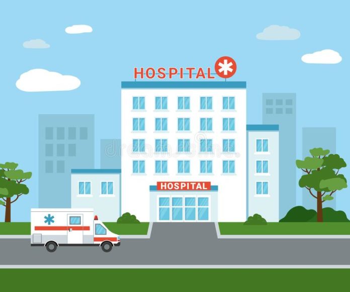 En dibujos un hospital y una ambulancia